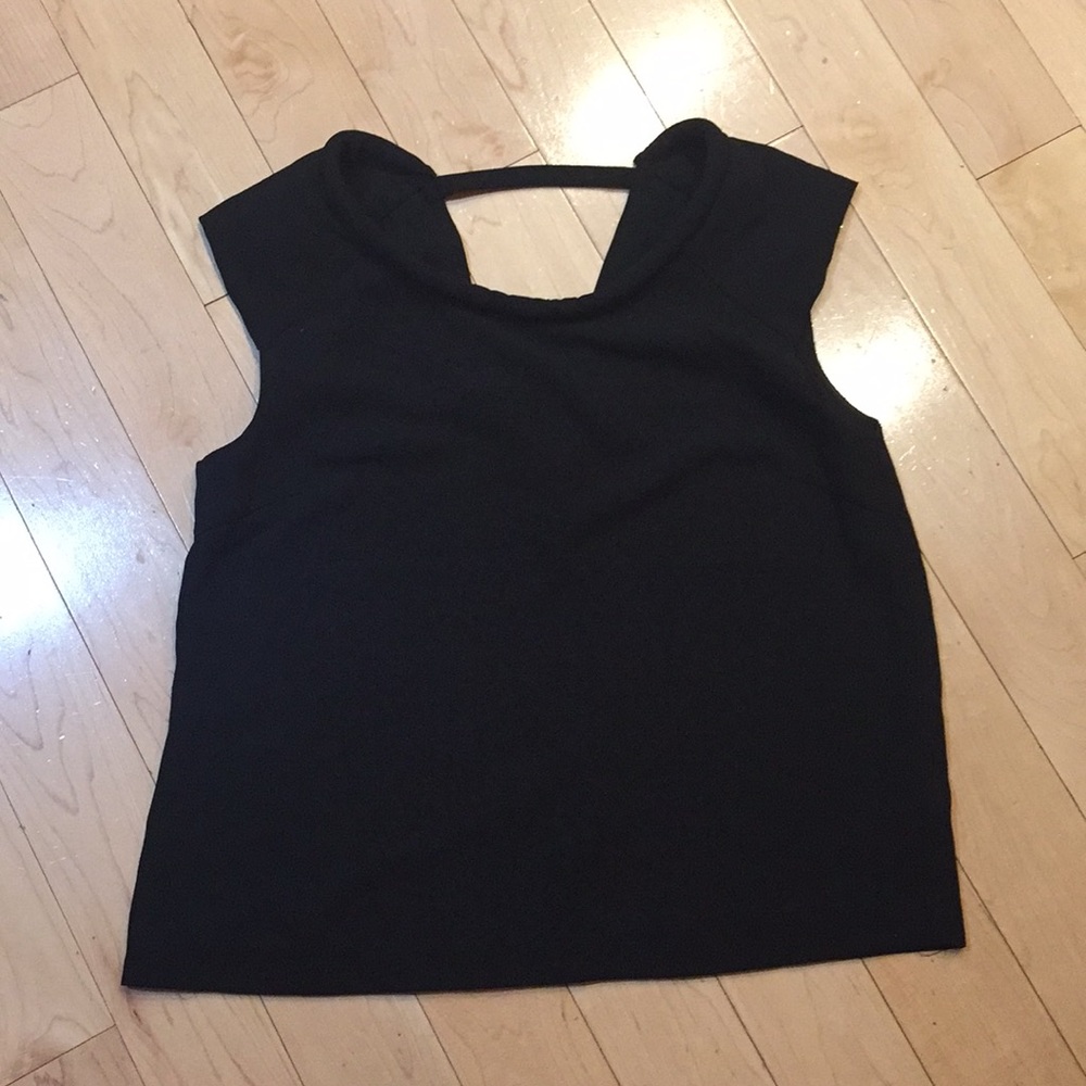 Black simple blouse with V backing.